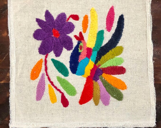 Otomi hand embroidered muslin coaster / cocktail napkin / frame-able art with multicolored bird and flowers.
