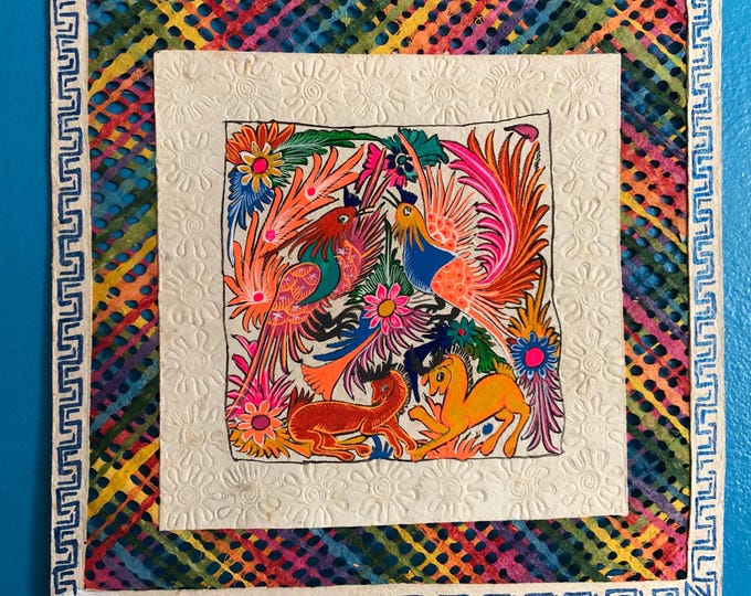 Amate Bark Paper Wall Art with woven border and colorful animal painted design (15 3/4” x 15 3/4”)
