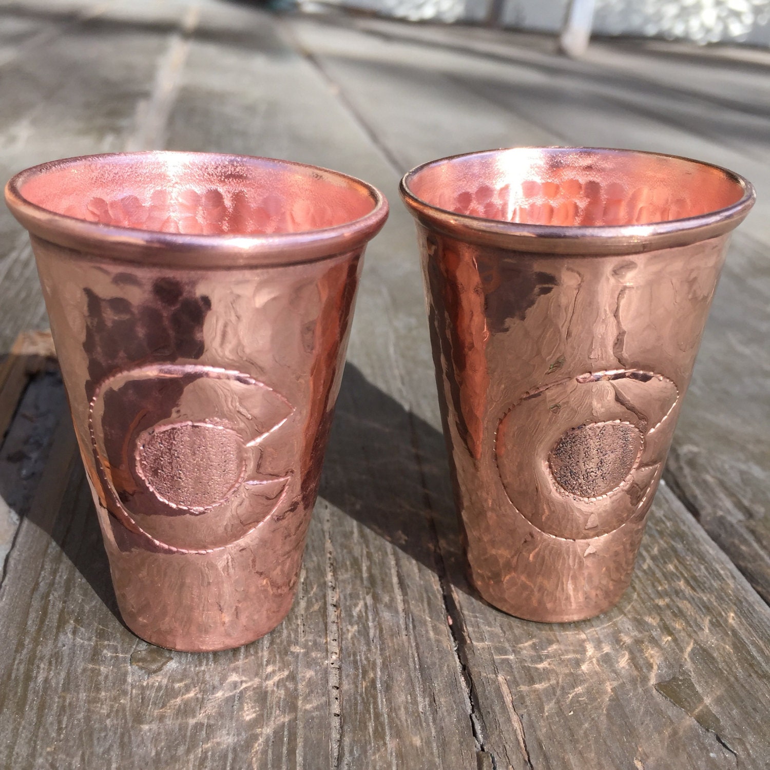2pk of 2 oz. pure hammered copper shot glasses with Colorado C engraved