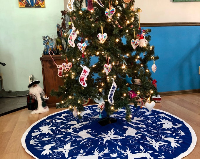 5’ Hand Embroidered Otomi Christmas Tree Skirt on beautiful blue muslin cotton with white border from Hidalgo, Mexico.