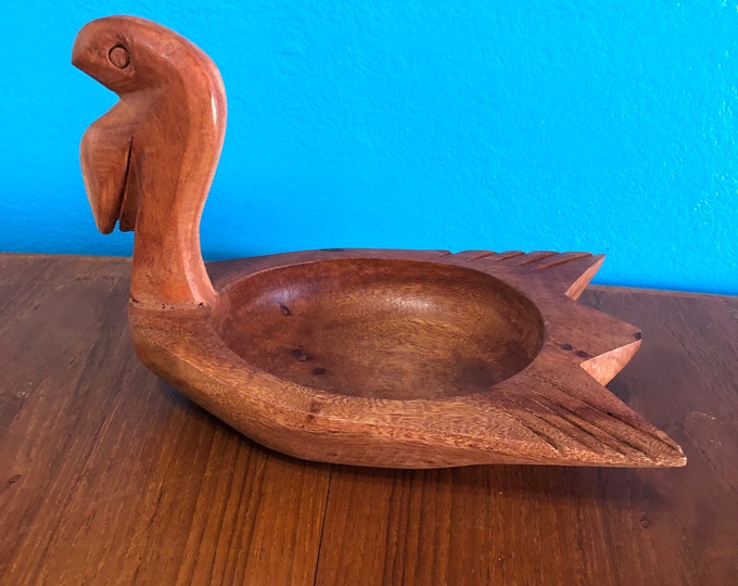 Hand carved wood pelican serving tray made with Guamuchil wood from Mexico