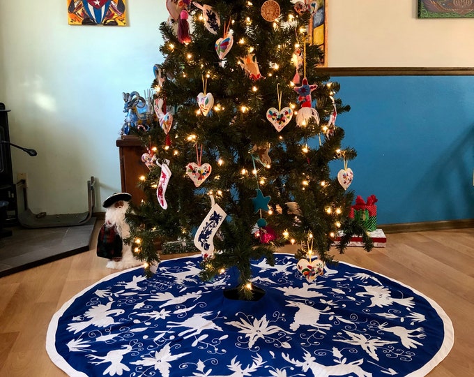 5’ Hand Embroidered Otomi Christmas Tree Skirt on beautiful blue muslin cotton with white border from Hidalgo, Mexico.