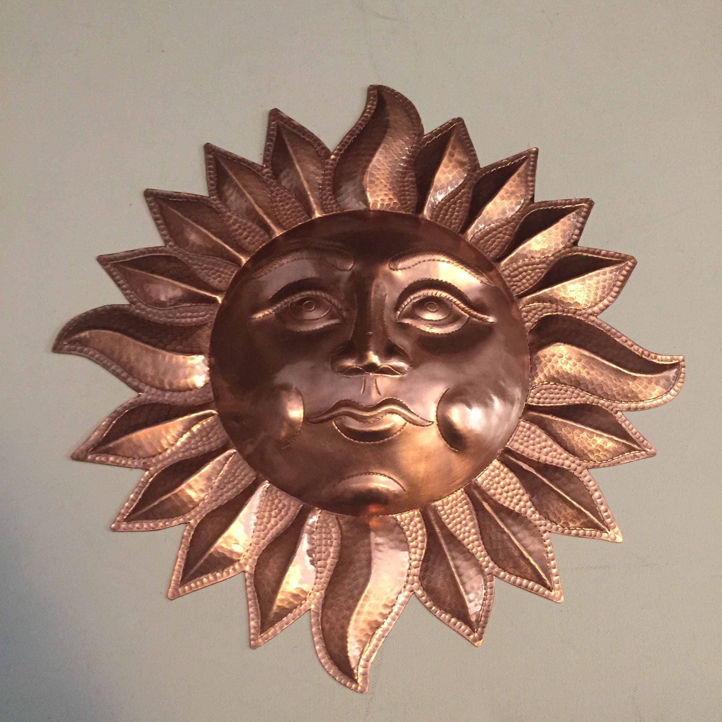 Handcrafted hammered copper 12 sun wall decor