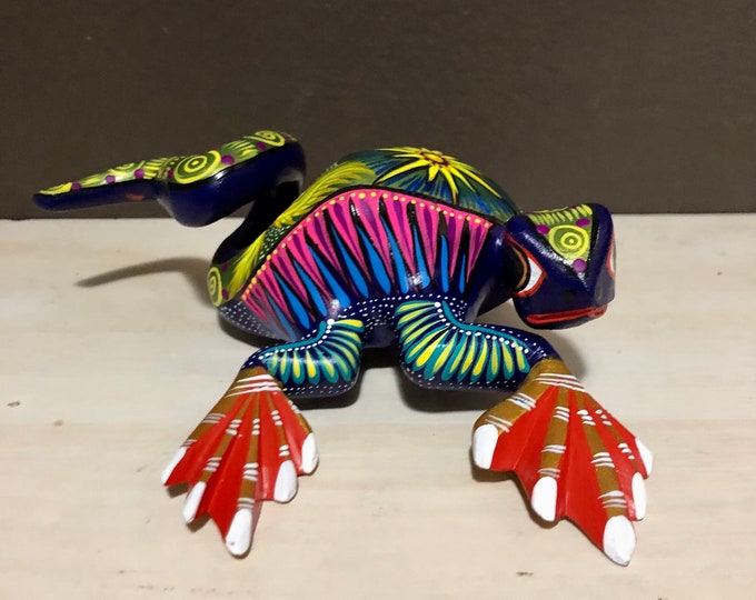 Alebrije Iguana Handcrafted Wood Carving by Zeny Fuentes from Oaxaca, Mexico.