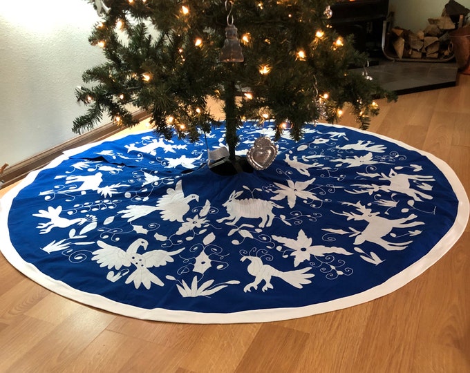 5’ Hand Embroidered Otomi Christmas Tree Skirt on beautiful blue muslin cotton with white border from Hidalgo, Mexico.