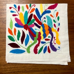 Otomi hand embroidered 19" x 19" muslin napkin - with spirit animal - multi-colored