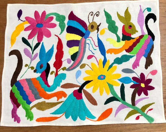 Hand embroidered Otomí placemat/frame-able art (approx. 17” x 13") - multicolor spirit animals and flowers.