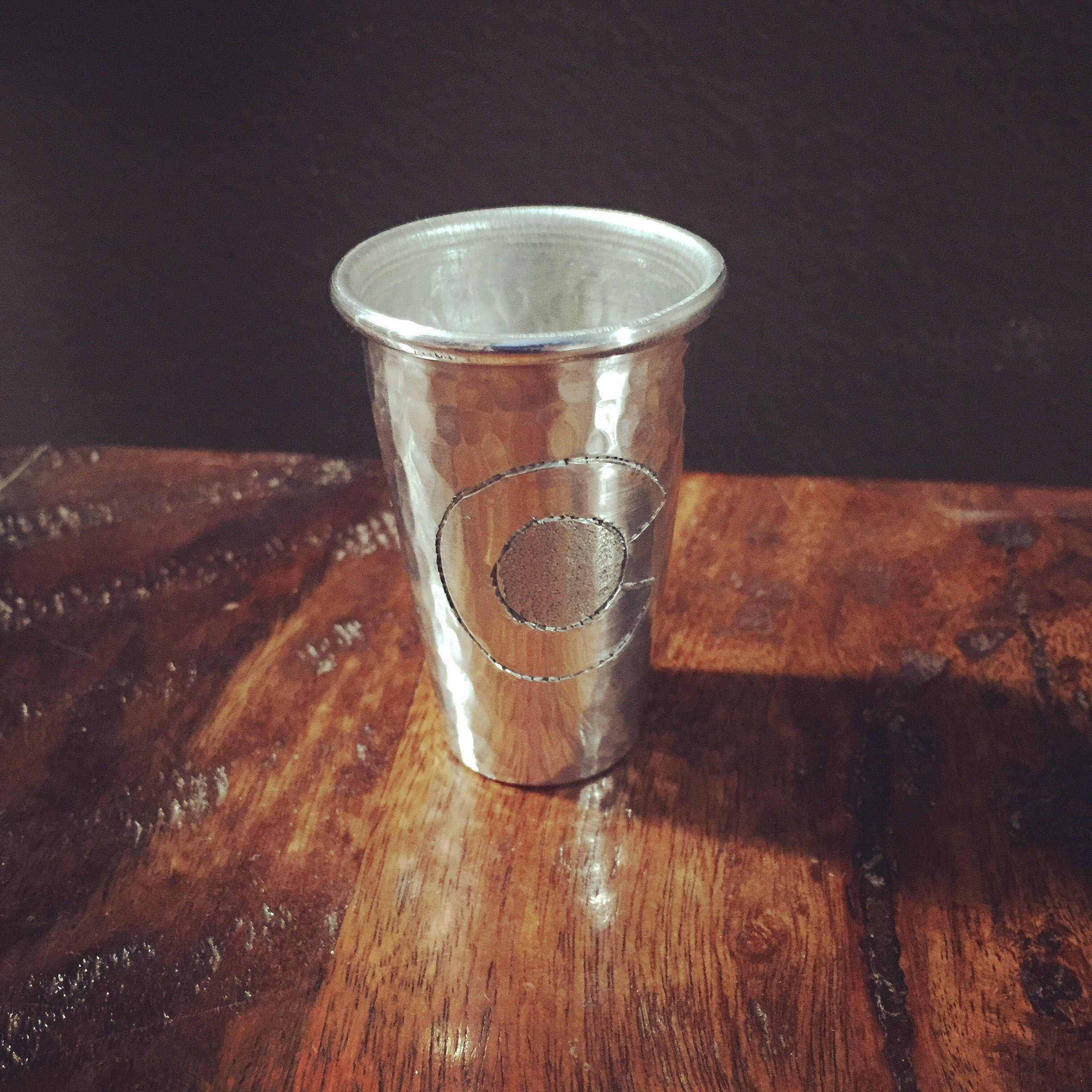 Handcrafted 2oz hammered aluminum shot glass with Colorado C engraved