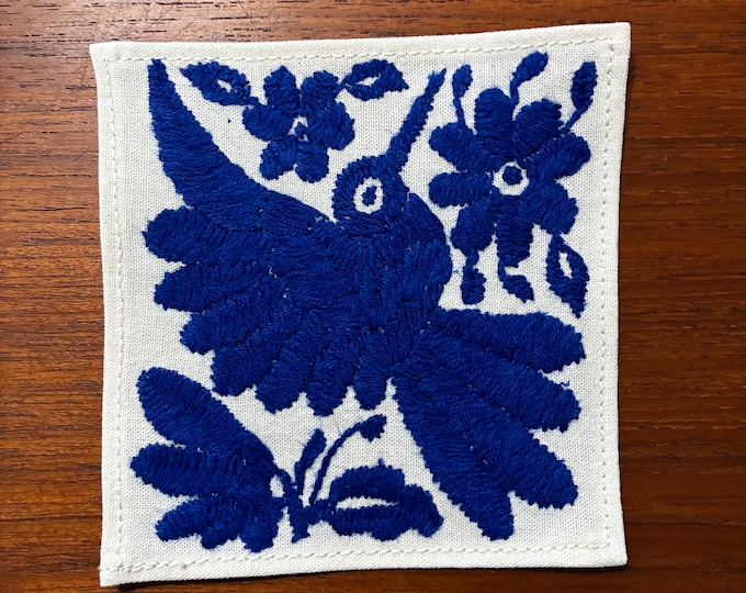 Otomi hand embroidered muslin cotton coaster / cocktail napkin / frame-able art with blue bird and flowers. (4 1/4” x 4 1/4”)