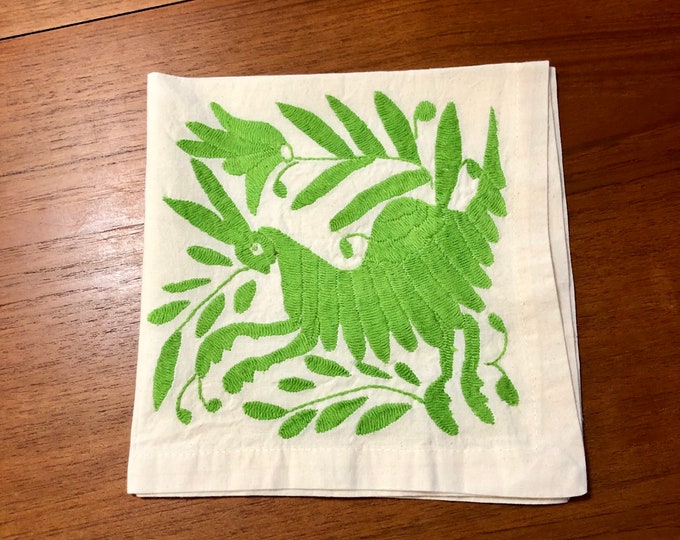 Otomi hand embroidered 19" x 19" muslin napkin with lime green spirit animal.