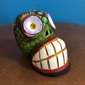 Alebrije Calavera Skull Handcrafted Wood Carving by Luis Garcia from Oaxaca, Mexico.