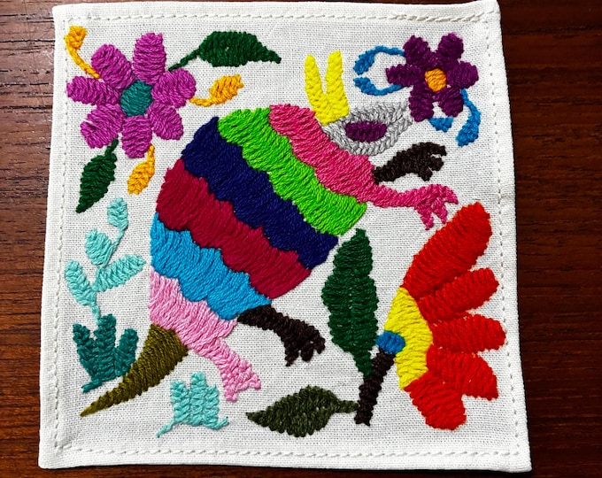 Otomi hand embroidered muslin cotton coaster / cocktail napkin / frame-able art with multicolored animal and flowers. (4 1/4” x 4 1/4”)