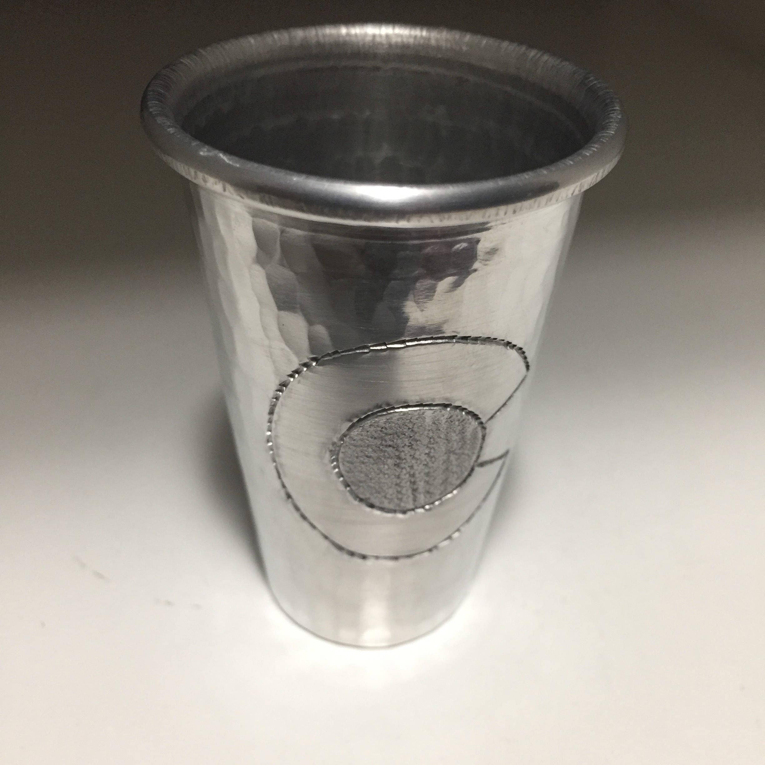 Handcrafted 2oz hammered aluminum shot glass with Colorado C engraved
