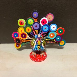 Alebrije Peacock Handcrafted Wood Carving by Zeny Fuentes and Reyna Piña from Oaxaca, Mexico.