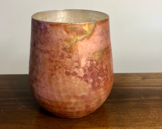 Hammered copper stemless wine glass with red patina finish