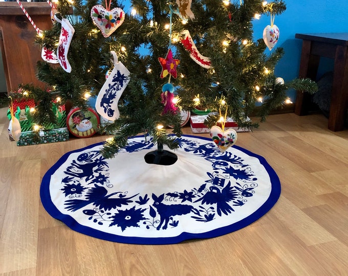 3’ diameter - Hand embroidered Otomi Christmas Tree Skirt on an off white muslin cotton with Blue embroidery and border from Hidalgo, Mexico