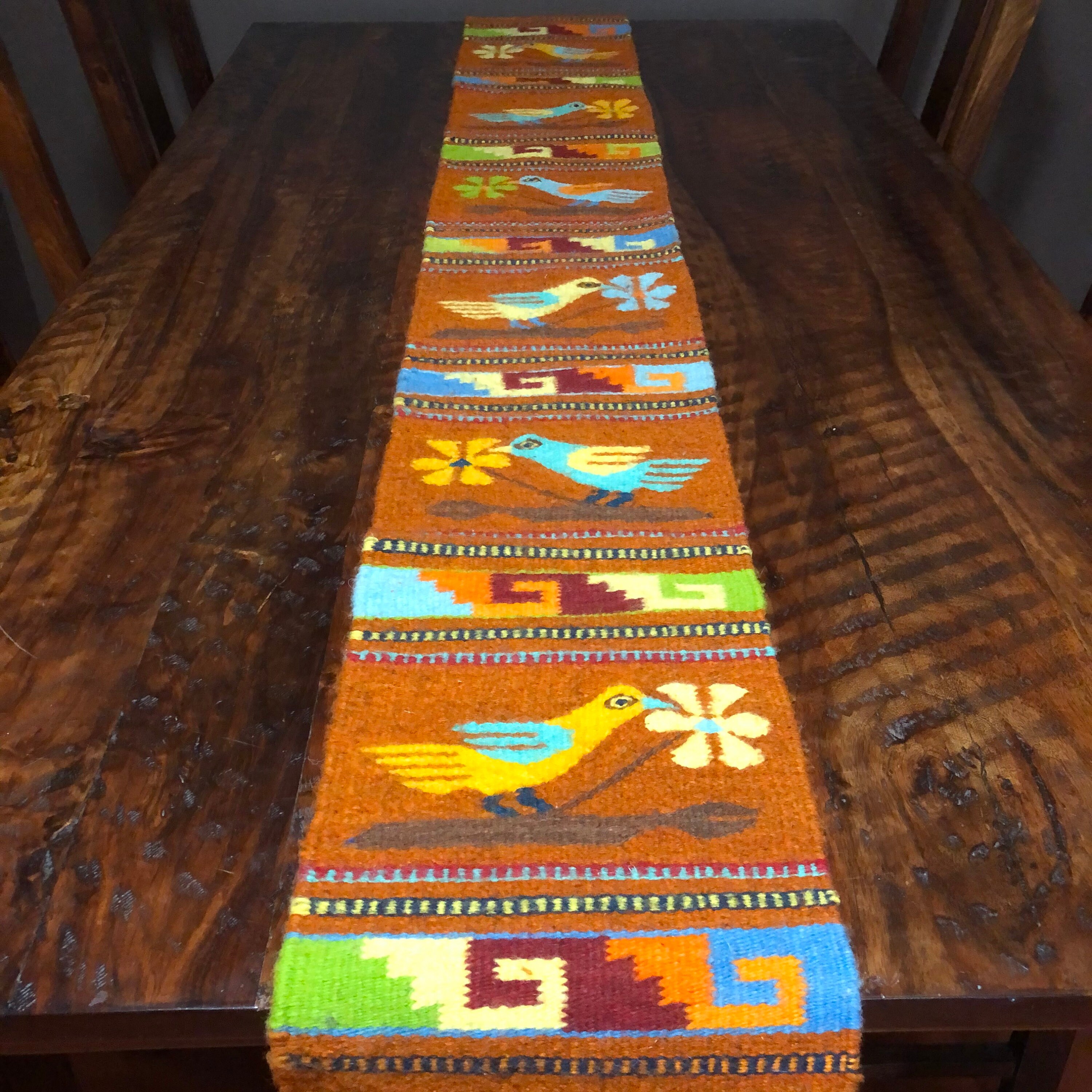Zapotec hand woven merino wool table runner with birds and flowers 78” x 10