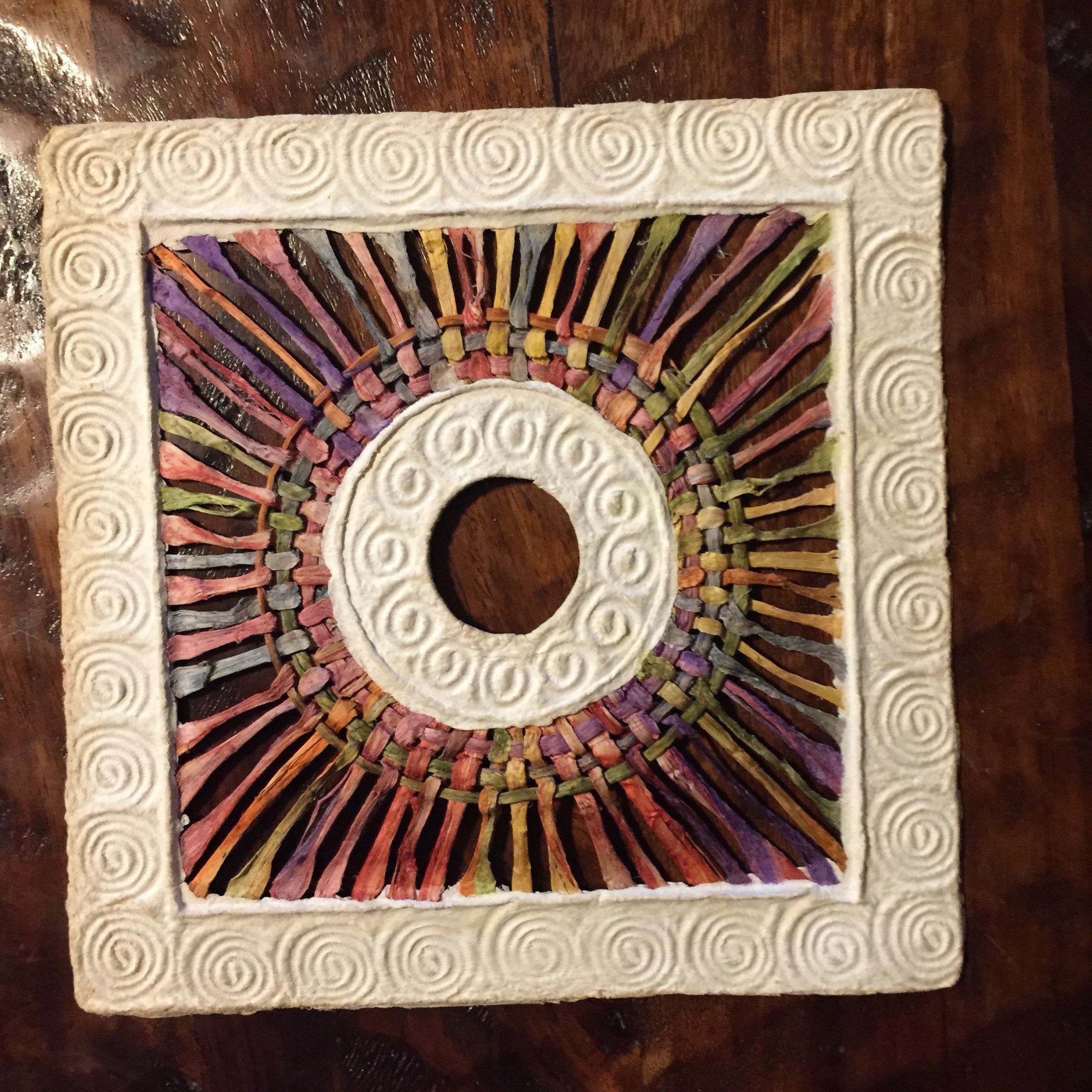 Handmade Amate Paper Wall Art with multicolor woven circle