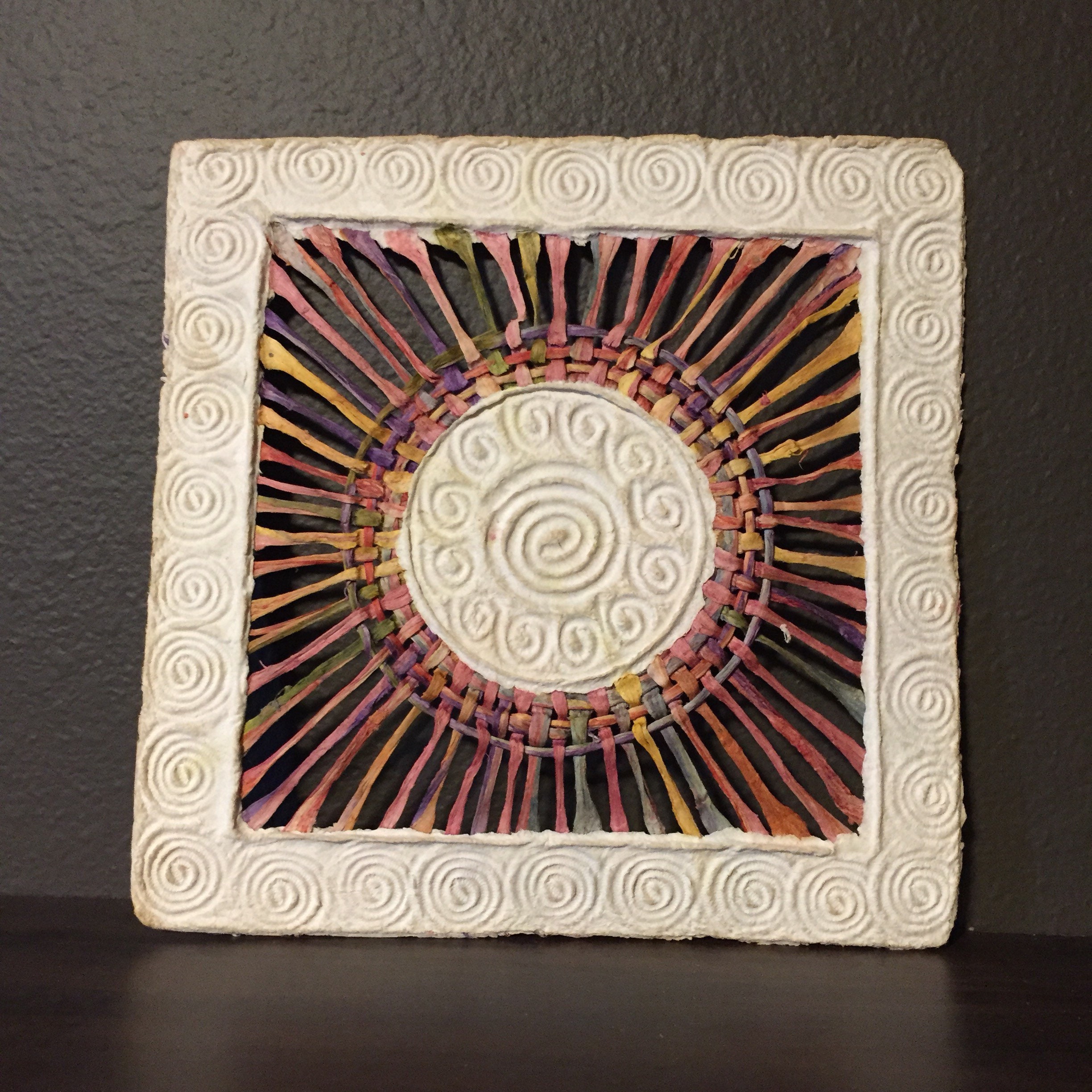 Handmade Amate Paper Wall Art with multicolor woven circle with spiral