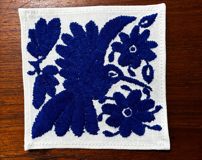 Otomi hand embroidered muslin cotton coaster / cocktail napkin / frame-able art with blue bird and flowers. (4 1/4” x 4 1/4”)