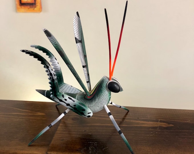 Alebrije Green Grasshopper Handcrafted Wood Carving by Zeny Fuentes and Reyna Piña from Oaxaca, Mexico.