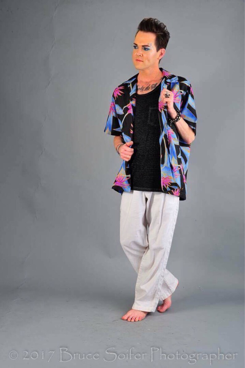 Vintage mens black Hawaiian button up shirt with purple and blue floral print