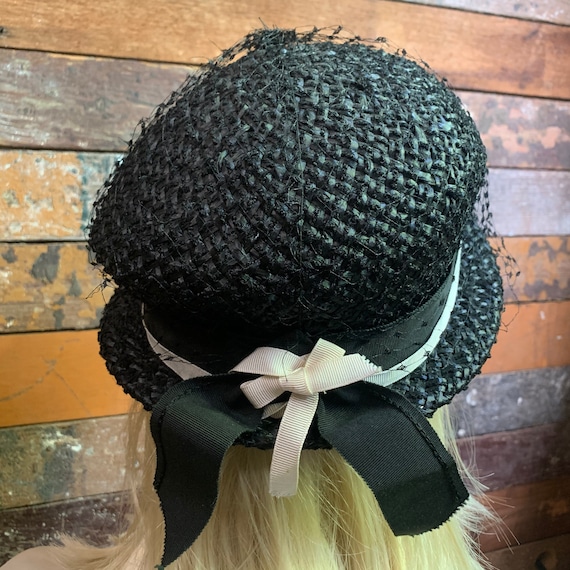 Black straw hat Gene Doris