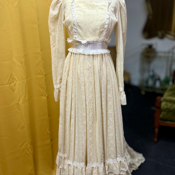 1970s beige floral and lace wedding gown with matching veil