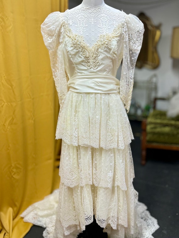 1980s puff sleeve lace wedding gown