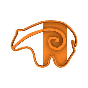 May include: An orange-colored badger-shaped cookie cutter. The cutter has a detailed outline of a badger with a curled tail design. The design is suitable for making badger-shaped cookies or other baked goods.
