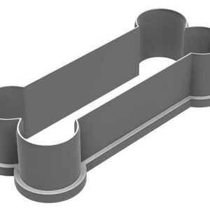 May include: A gray plastic dog bone-shaped cookie cutter. The cutter has a rectangular center with rounded ends, and a thin white outline. The design is simple and clean, perfect for making dog treats or themed cookies.