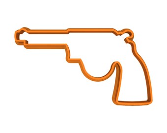 Cortadores de galletas y fondant con forma de pistola