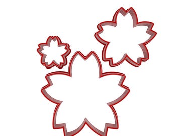 Juego de tres pequeños cortadores de arcilla polimérica con forma de flor de cerezo
