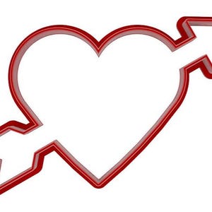 May include: A red heart shape pierced by an arrow, creating a Valentine's Day or romantic theme. The arrow passes through the center of the heart. The design is a simple outline, perfect for crafting or decorations.
