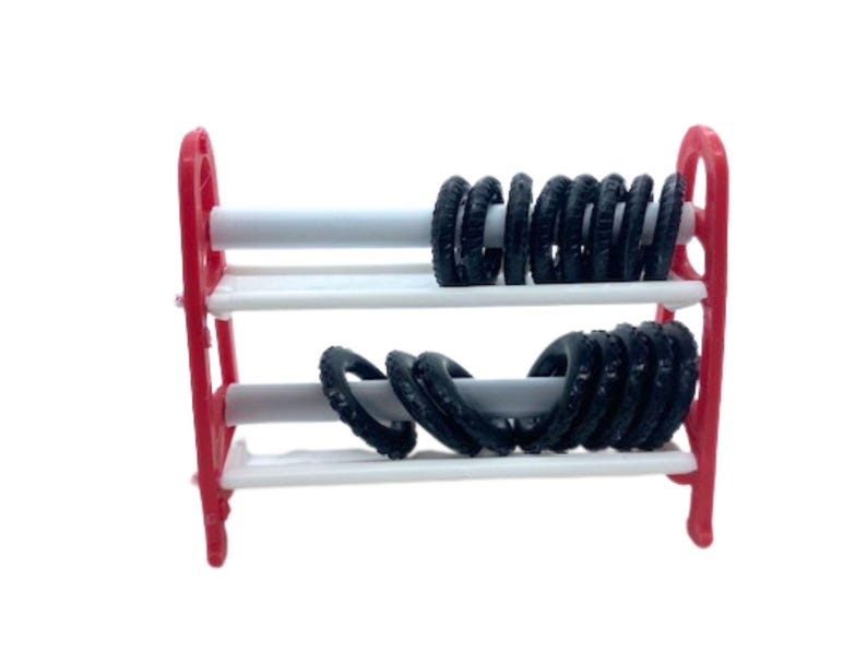 Puede incluir: Un &aacute;baco rojo y blanco con dos filas de anillos negros. El &aacute;baco tiene un marco rojo y barras horizontales blancas que sostienen los anillos negros, dise&ntilde;ado para contar y matem&aacute;ticas b&aacute;sicas.