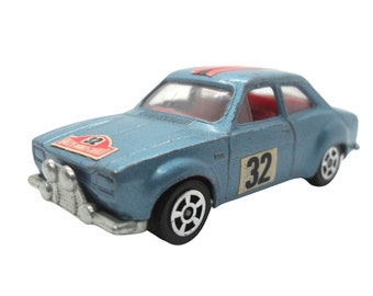 1980s Vintage Corgi Juniors 63 Ford Escort Monte Carlo Rally Car. Toy Collectible. Made in England