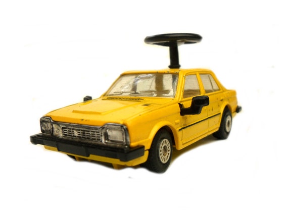 corgi driving school car