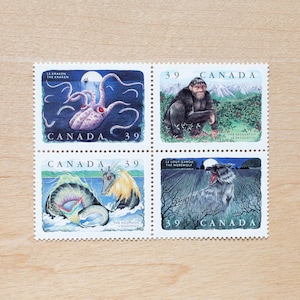 Criaturas míticas: sellos postales antiguos de Canadá, hombre lobo, pie grande, Canadá, sobres caligráficos, ogopogo, kraken, folclore