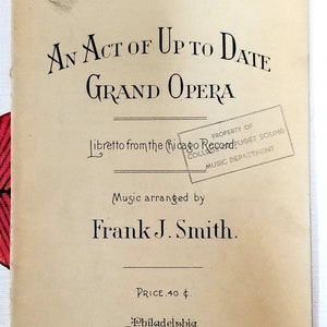 May include: A vintage program for a grand opera performance, titled "An Act of Up to Date Grand Opera". The program is printed on cream-colored paper with black text and features a stamp from the Chicago Record.