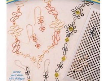 May include: A craft kit labeled "Thing-A-Ma Jig" with the Darico logo. The kit includes an aluminum wire jig, pegs, patterns, and a blank template. The image shows examples of wire jewelry, including necklaces and earrings.