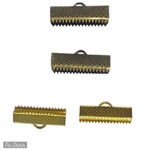 May include: Three metal clasps for jewelry making. Two are antique gold and one is gold. Each clasp has a loop and a serrated edge.