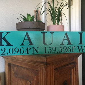 KAUAI wood sign with geographic coordinates