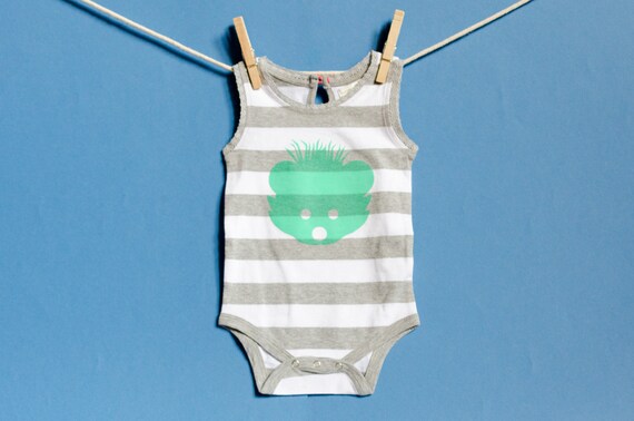 white sleeveless onesie