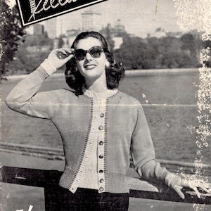 May include: A black and white photo of a woman wearing a knitted cardigan with buttons. The cardigan has a white trim. The woman is wearing sunglasses and is standing in front of a body of water. The text "Villawool Knitting Book N° 60" is at the top of the image. The text "1/6" is at the bottom of the image.