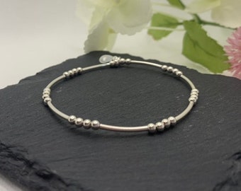 Delicate sterling silver beaded stretch bracelet. Fine sterling silver bracelet. Silver thin tube bracelet. Delicate silver bracelet. Dainty