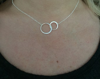 Interlocking circle necklace. Silver interlocking circle necklace. Linked circle pendant. Double circle necklace. Two circles necklace