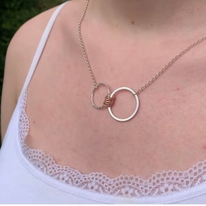 Sterling Silver 50th birthday necklace. 50th birthday gift. 50th birthday gift for women. 5 ring pendant.