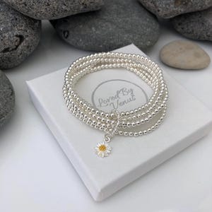 Sterling silver daisy bracelet. Layered  stacking charm bracelet. Flower jewellery for her