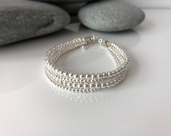 5 strand bracelet. Layered sterling silver bracelet. Silver multistrand bracelet. Silver beaded bracelet. Multiple strand bracelet