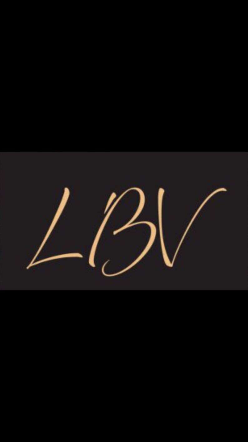 May include: A logo with the letters LBV in a stylized font, written in a light brown color against a black background.